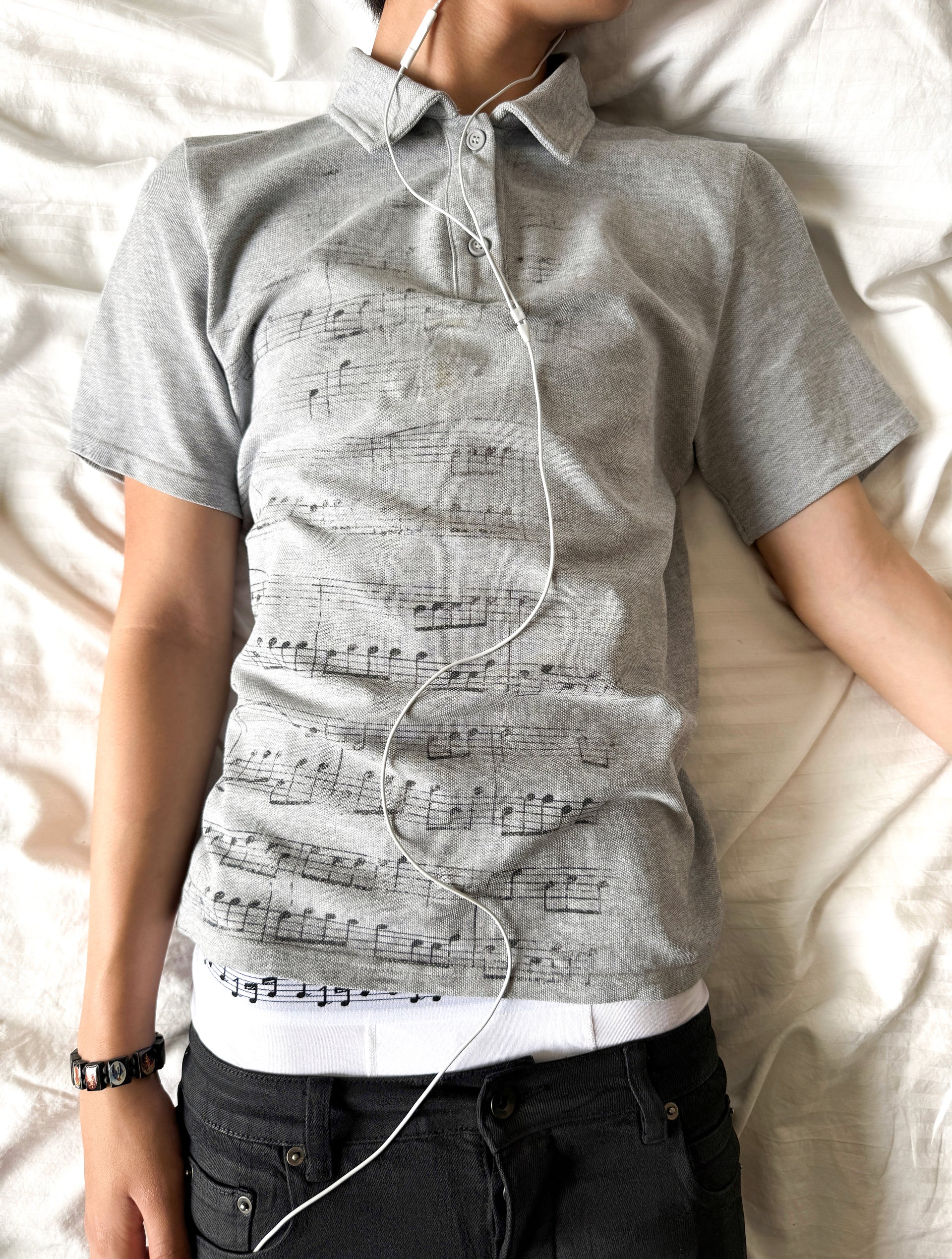 “notes” polo shirt